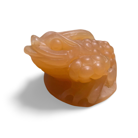 ORANGE CALCITE MONEY TOAD CARVING