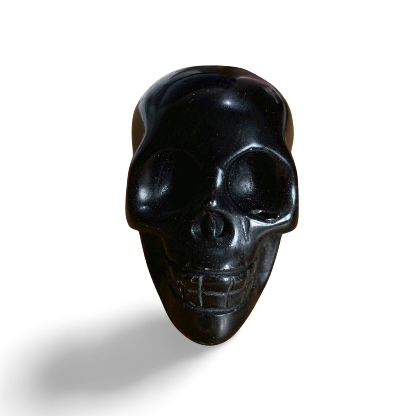 OBSIDIAN SKULL CARVING